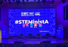 Imagen de auditorio con el fondo #STEMinistA